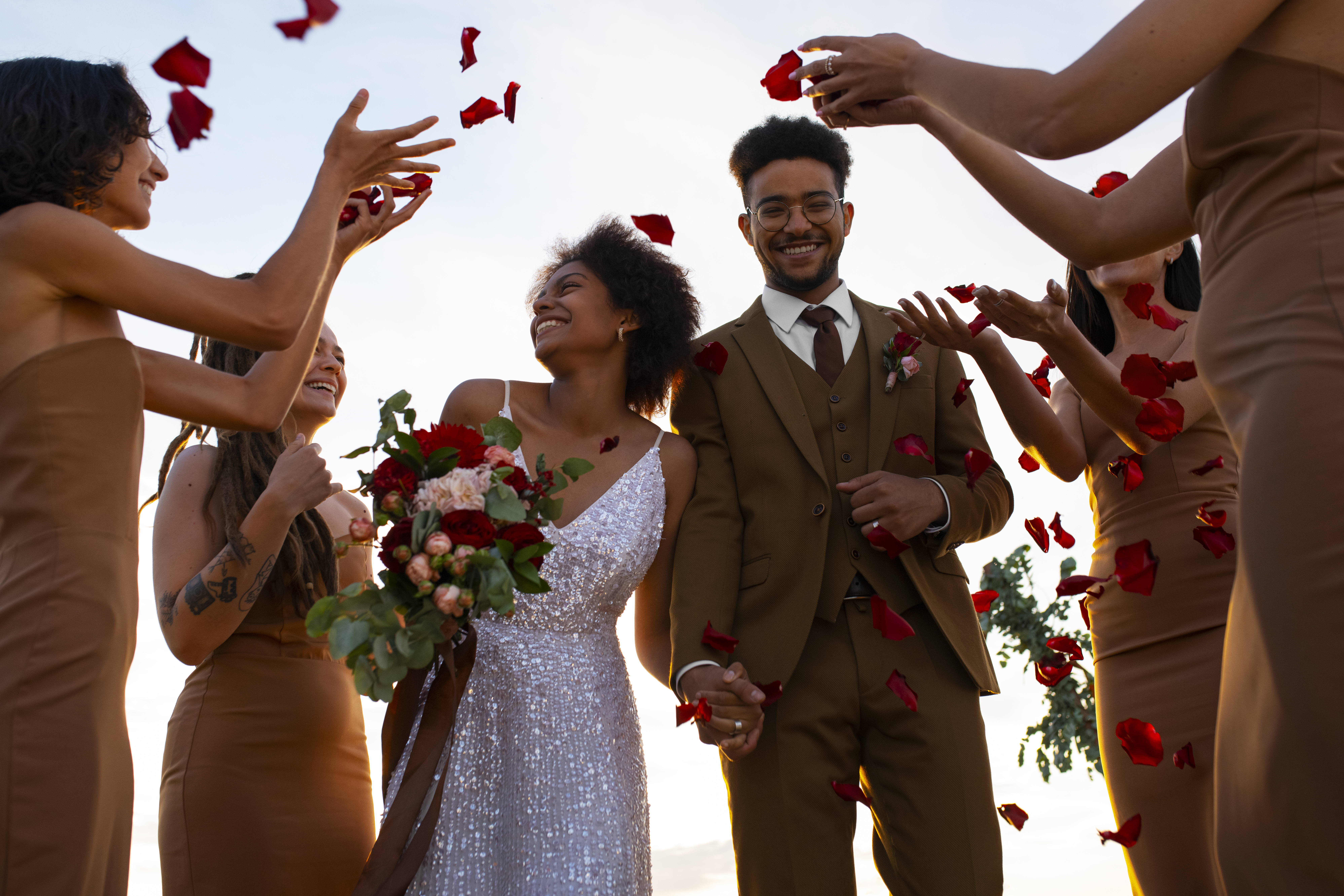 Beautiful wedding ceremony with bride and groom exchanging vows surrounded by family and friends in a romantic outdoor setting